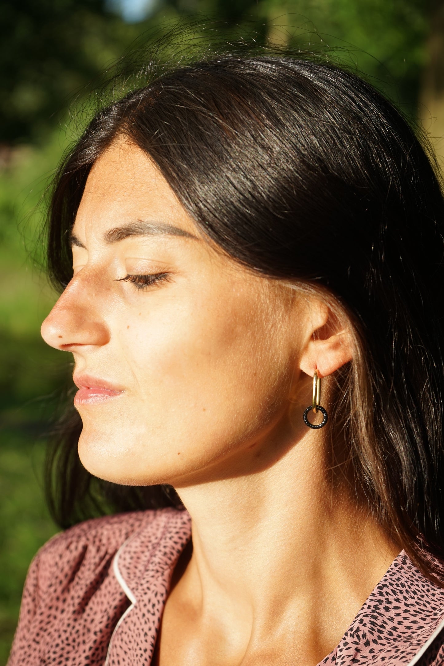Shiny black and gold circle earrings