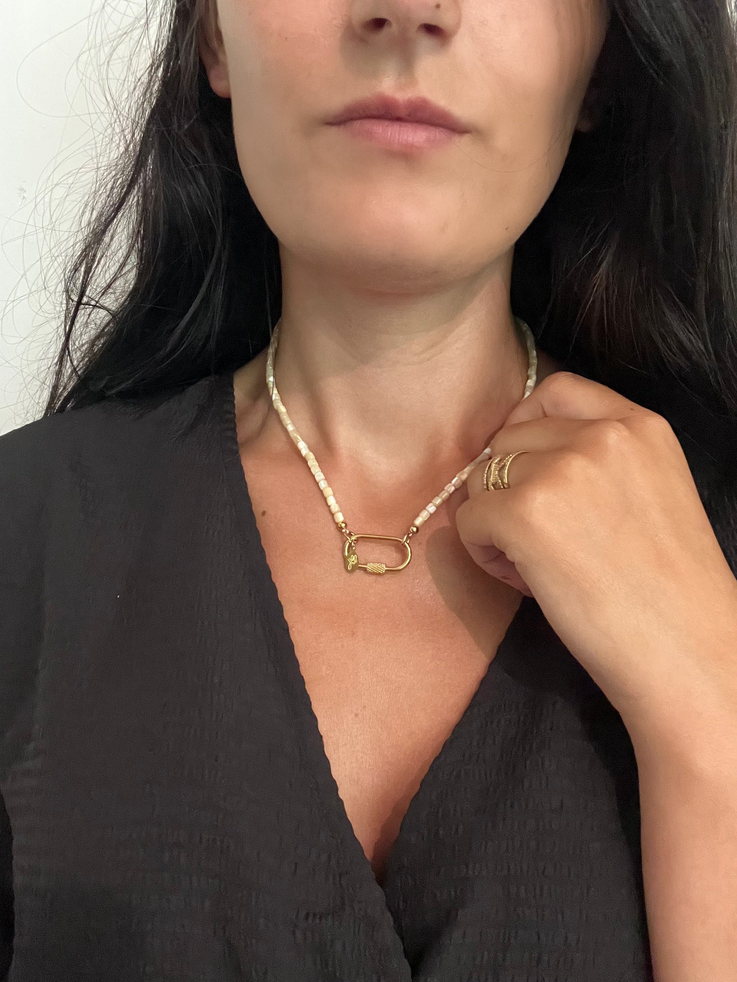 Gold sea shell hook necklace