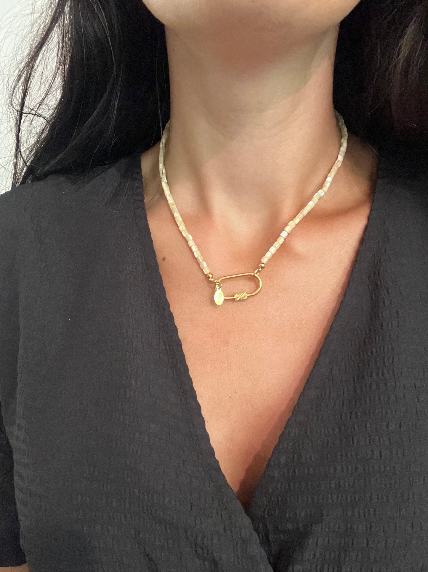 Gold sea shell hook necklace